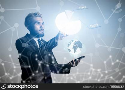Businessman hand with business chart icons network connection. Business communication concept. Businessman with globe on surface screen.