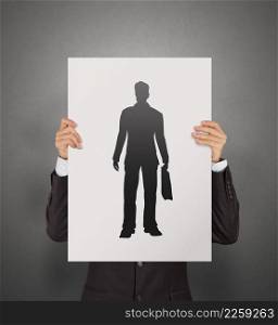 businessman hand with poster choosing people icon as human resources concept