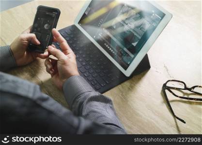 Businessman hand working concept. Photo professional investor working with new startup project. Finance managers meeting.Digital tablet dock screen computer design smart phone using. Sun flare effect  