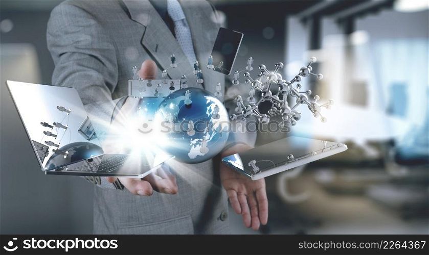 businessman hand working with modern technology and digital layer effect as business strategy concept
