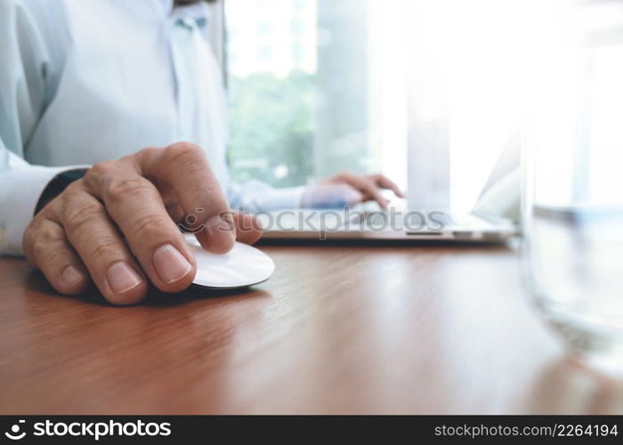 businessman hand working with modern technology as business strategy concept