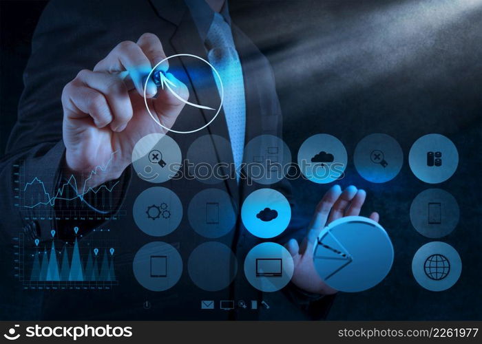 businessman hand working with new modern computer and business strategy as concept