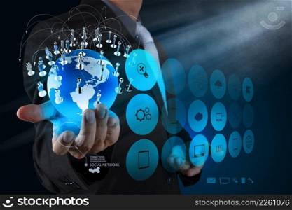 businessman hand working with new modern computer show the earth social network structure