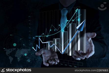 businessman hand working with virtual chart business on touch screen computer as concept