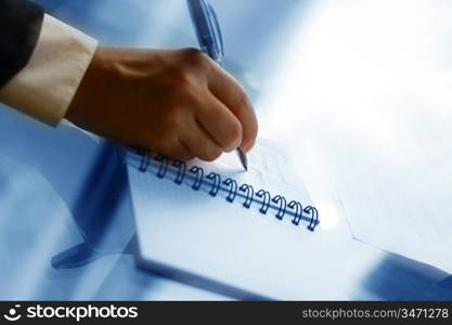 businessman hand write message in note