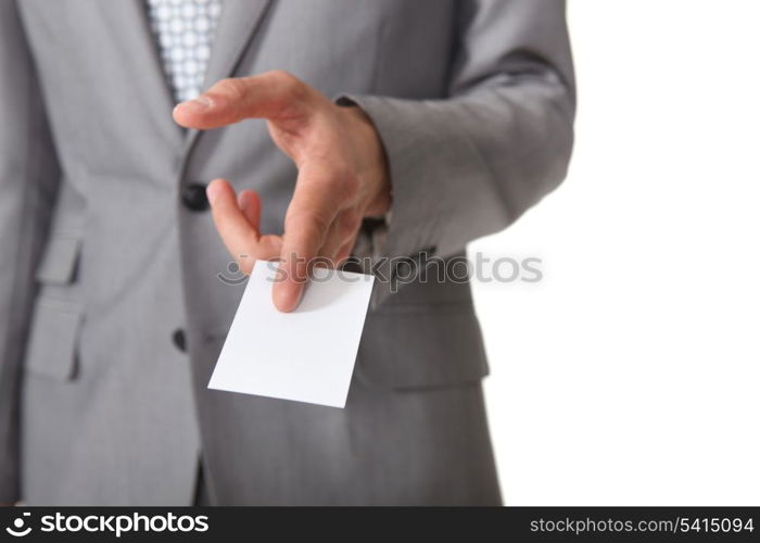 Businessman handing out card