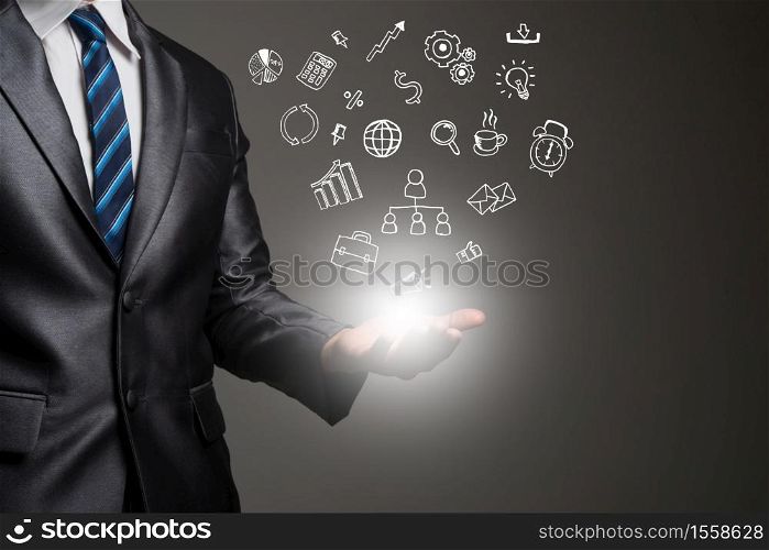 Businessman hands with doodle business icons. Communication concept.