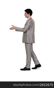 Businessman handshaking alone on white background