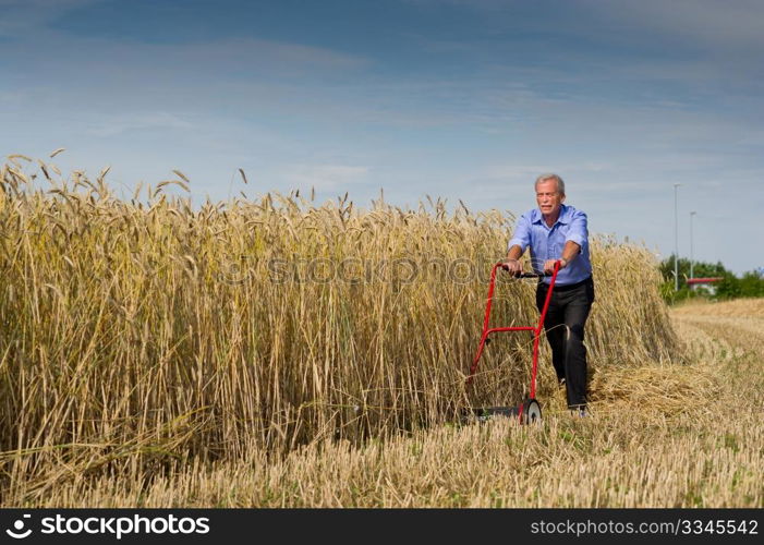 Businessman harvesting the fruits of his labor