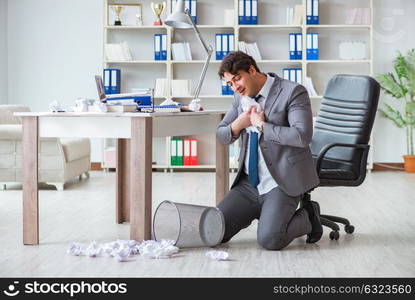 Businessman having fun taking a break in the office at work