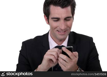 businessman having fun with his smart phone