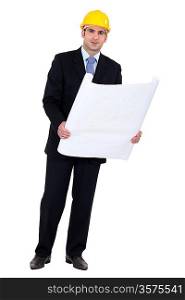 businessman holding a blueprint