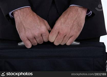 businessman holding a briefcase