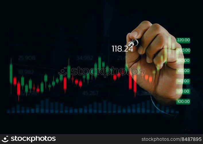 Businessman holding a chart a foreign exchange trader investing in technology business chart and a currency data concept.