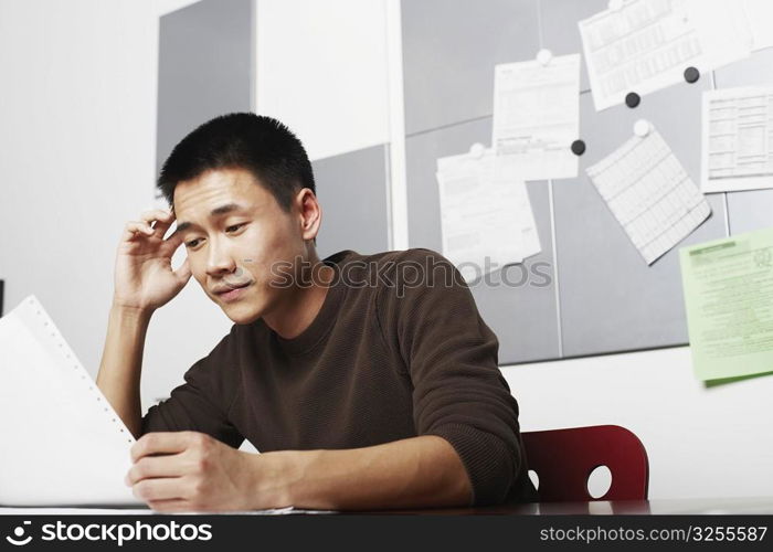 Businessman holding a printout