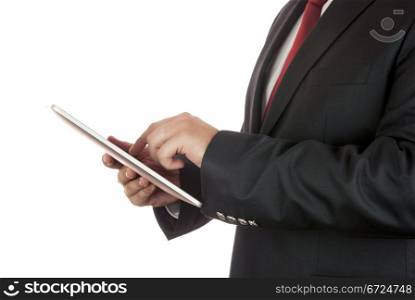 Businessman holding a tablet computer in his hands