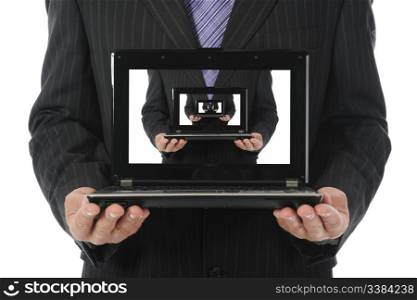 Businessman holding an open laptop. Isolated on white background