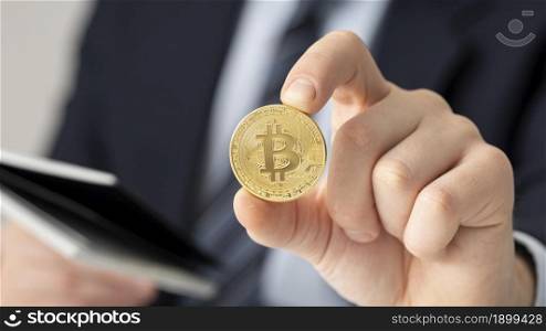 businessman holding bitcoin close up. Resolution and high quality beautiful photo. businessman holding bitcoin close up. High quality beautiful photo concept