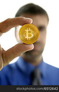 Businessman holding Bitcoin currency in hands. Businessman holding Bitcoin currency in hands on white background