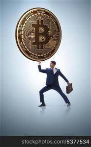 Businessman holding bitcoin in cryptocurrency blockchain concept