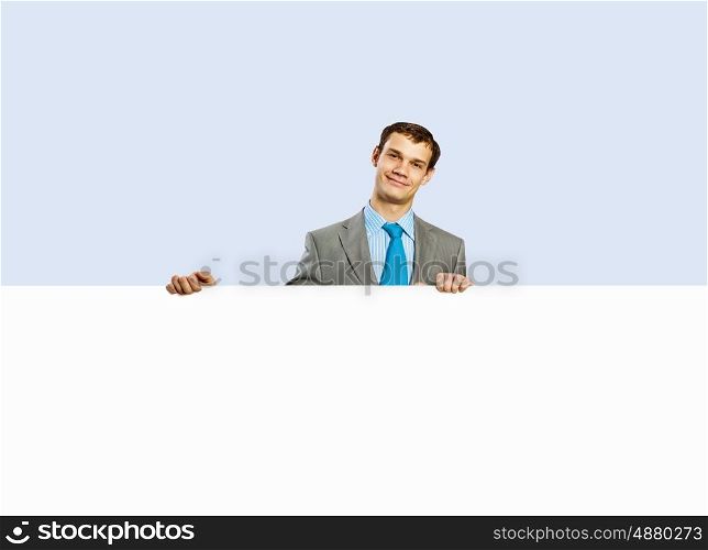 Businessman holding blank banner. Advertising manager with billboard. Place for text