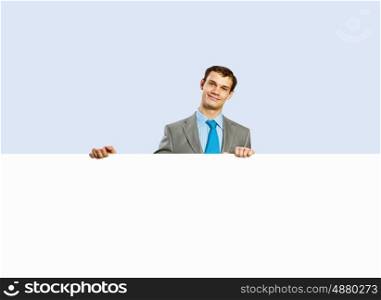 Businessman holding blank banner. Advertising manager with billboard. Place for text