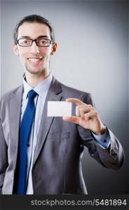 Businessman holding blank message