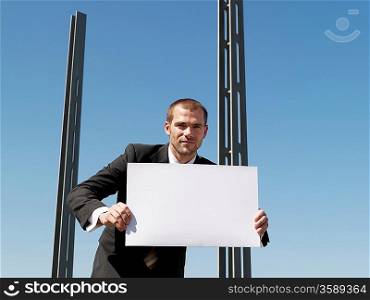 Businessman Holding Blank Sign