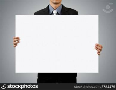 businessman holding blank sign and hand on white