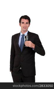 Businessman holding champagne glass