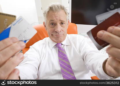 Businessman Holding Credit Cards