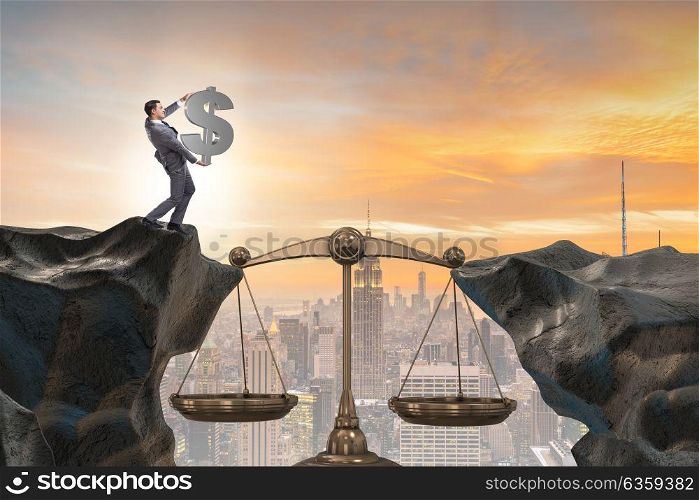 Businessman holding dollar sign in justice concept