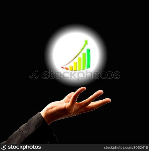 Businessman holding growing graph in abstract light