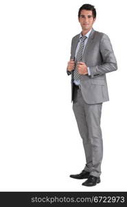 Businessman holding jacket