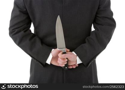Businessman Holding Knife Behind His Back