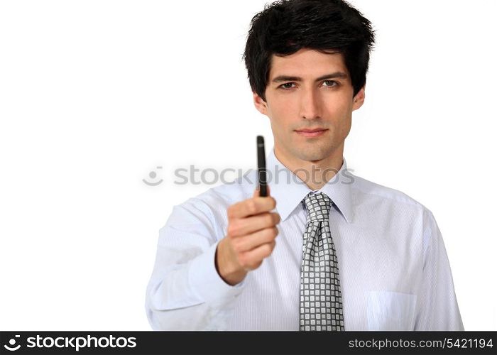 Businessman holding pen