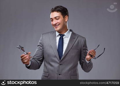 Businessman holding star award in business concept