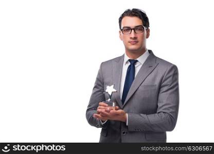 Businessman holding star award in business concept