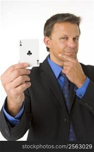 Businessman Holding The Ace Of Clubs