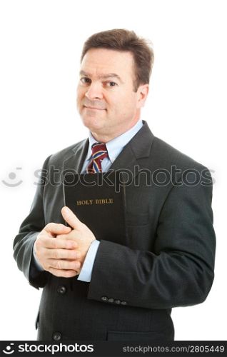 Businessman holding the Bible. Isolated on white.