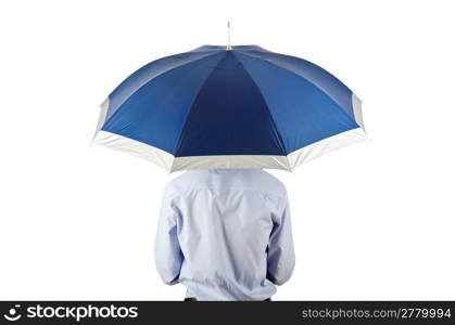 Businessman holding umbrella in the office