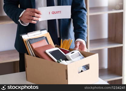 Businessman holding with I quit words card letter, resign employee Change of job concept