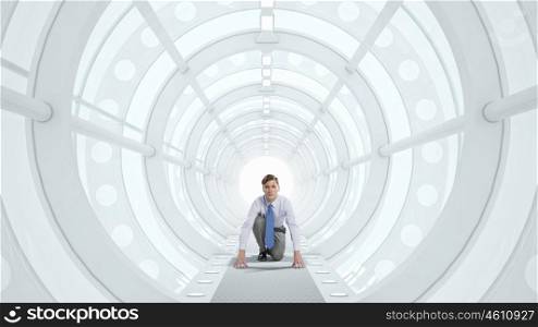 Businessman in 3D room mixed media. Young businessman running in futuristically designed tunnel