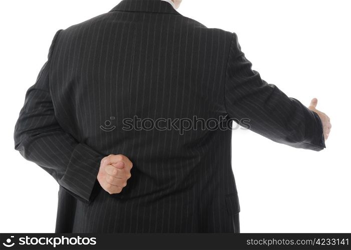Businessman in a suit holds out his hand for a handshake. Isolated on white