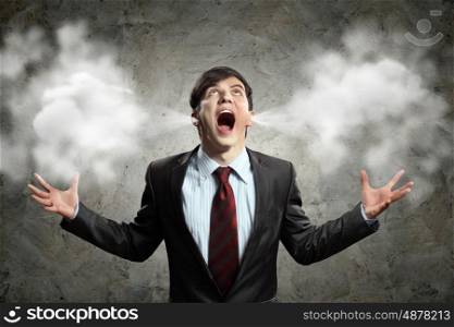 businessman in anger. businessman in anger screaming puff going out from ears
