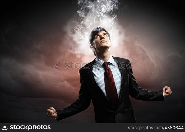 businessman in anger. businessman in anger with fists clenched and steam above head