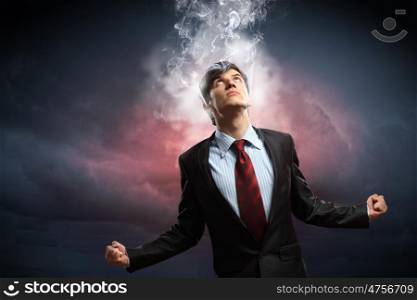 businessman in anger. businessman in anger with fists clenched and steam above head