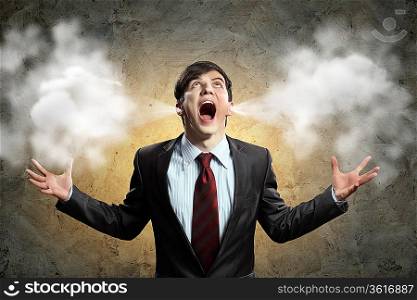 businessman in anger screaming puff going out from ears