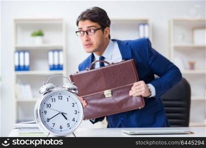 Businessman in bad time management concept