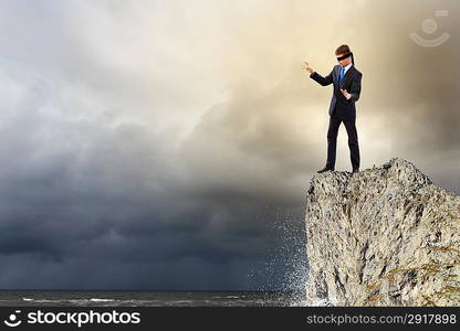 Businessman in blindfold